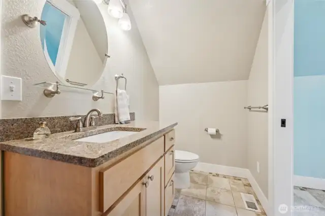 Second bedroom's private bathroom.