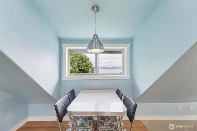 The 579sqft loft apartment above the detached 3-car garage has lots of space, a kitchenette and bathroom.