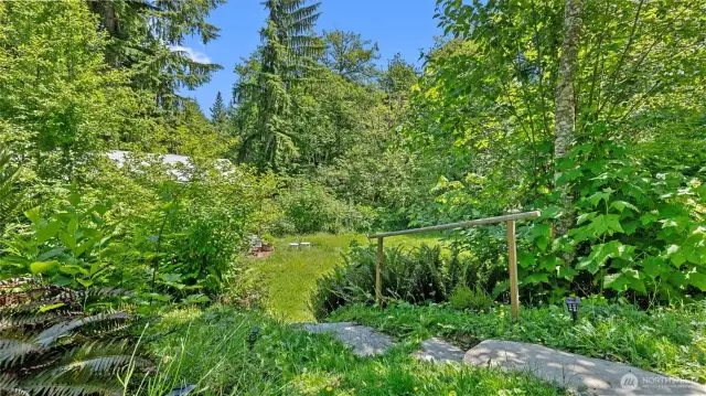 A lovely pathway to the backyard from the upper RV parking area.