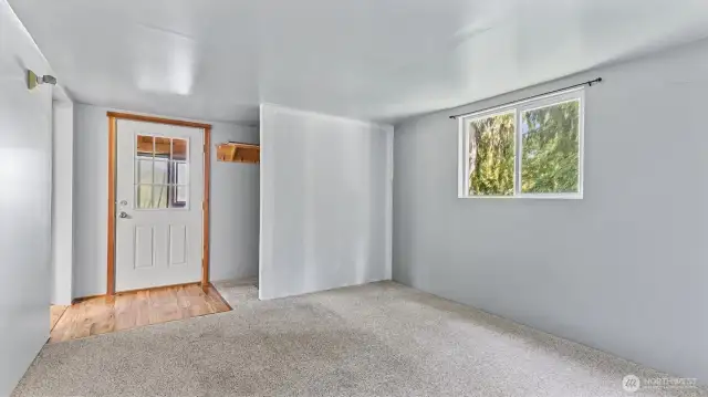 The bonus room, front door and large storage space on the right.