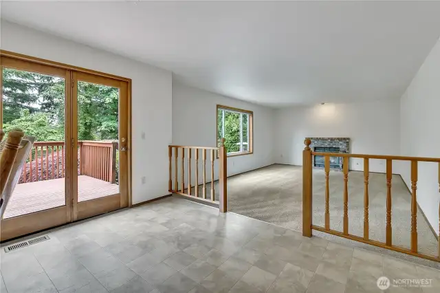 The kitchen flows into the informal areas of the home.