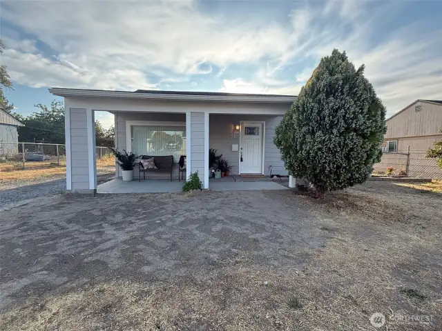 Notice the unique covered front entry