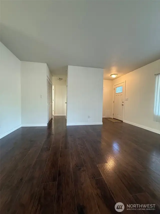 Notice how clean and inviting this living room space and imagine the interior design opportunities for a new owner to make it their own
