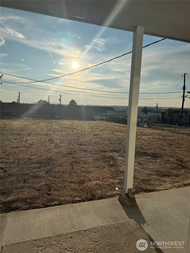 Notice how level this fully fenced backyard is.  Just imagine what can be done with it by the new owner.