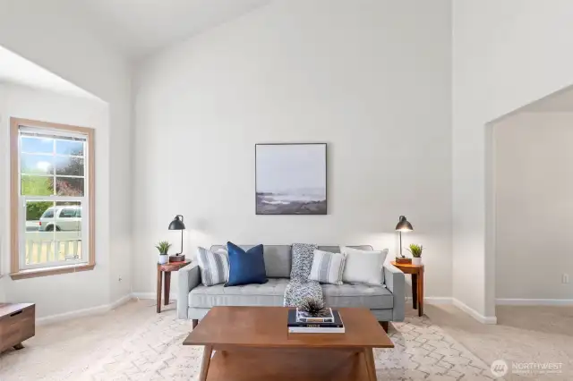 Living room has vaulted ceiling