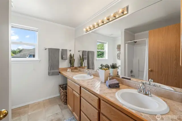 Upstairs main bath has double sinks!