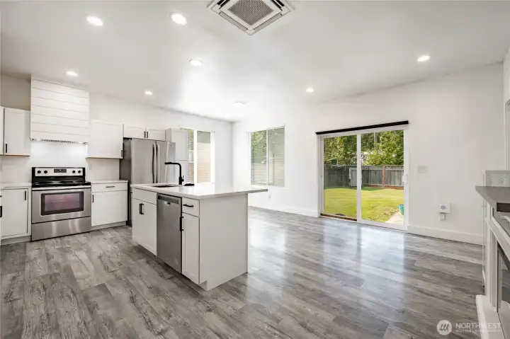 Cheery. light filled kitchen.