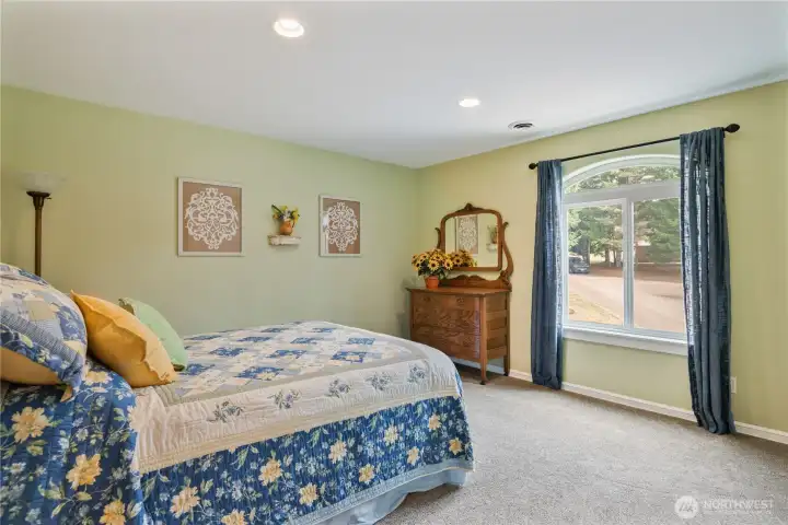 3rd Bedroom upstairs - plenty of room and light and ambiance.  (Love the way they carried the theme of the windows throughout these rooms!)