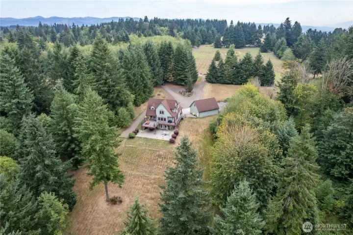 Park-like setting for this Smokey Ridge home, sitting in a bowl of serenity (and yet not that far from what you need)