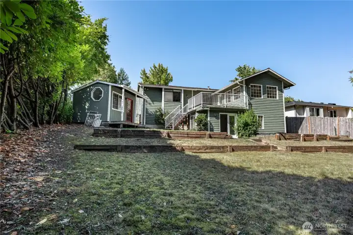 The backyard is spacious, private, and fully fenced.