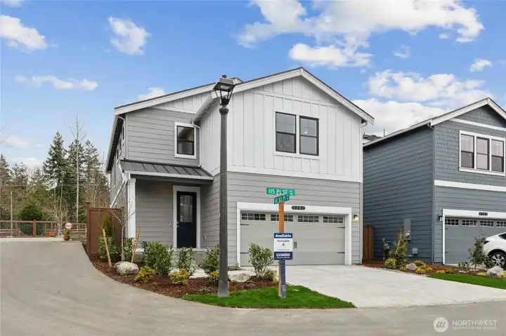 Home sits on a desirable corner lot. 2-car garage with 50AMP plug in the garage for your EV.