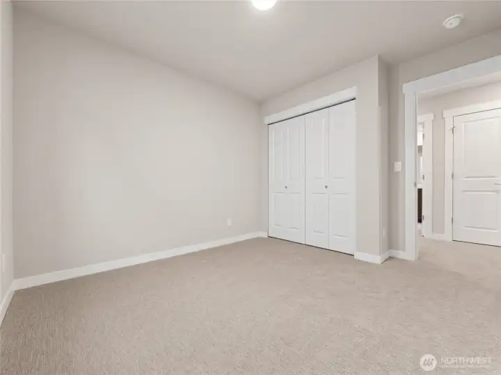 3rd bedroom.  Actual home is under construction and materials, colors, and finishes will vary. See site agent for details.