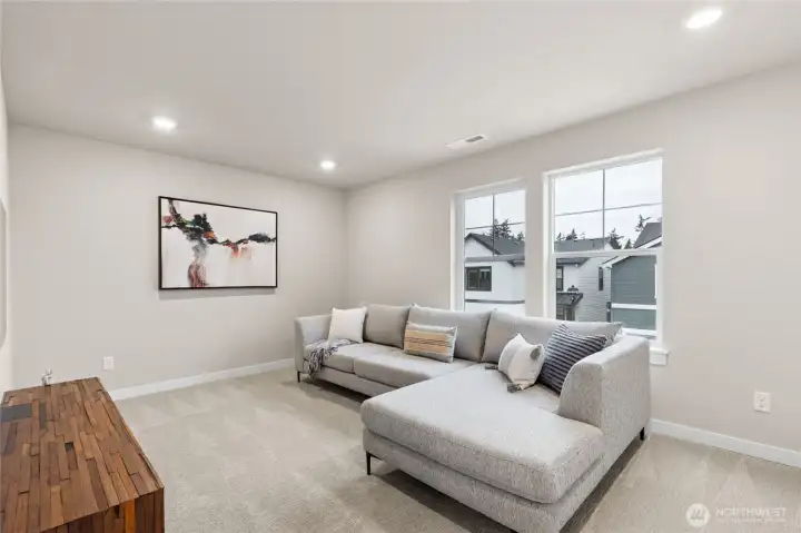 Very large bonus/bedroom with 2 closets at the opposite side of primary bedroom.  Materials, colors, and finishes will vary. See site agent for details