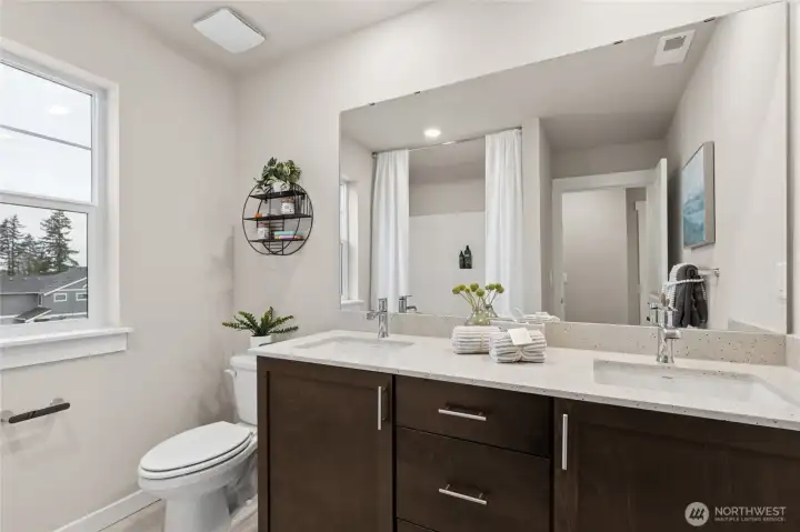 2nd full bath on the second level.  Materials, colors, and finishes will vary. See site agent for details