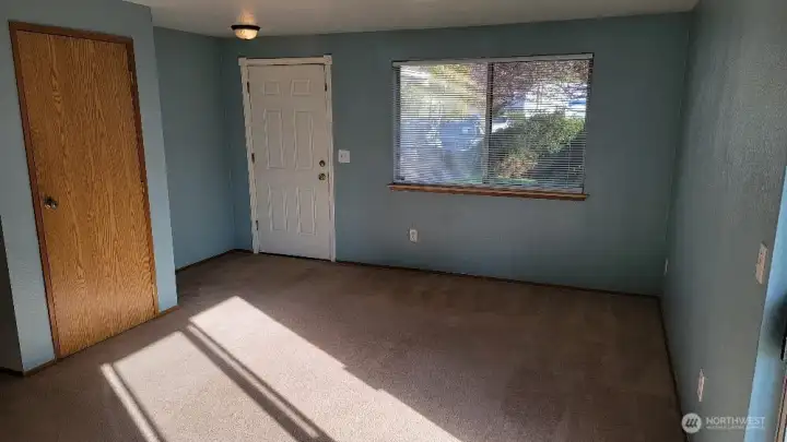 Front Room Front Door and large slider out to the patio & back yard