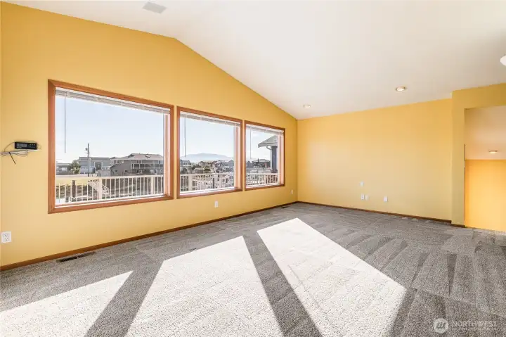 Big beautiful windows bring lots of light! Spacious Living Room