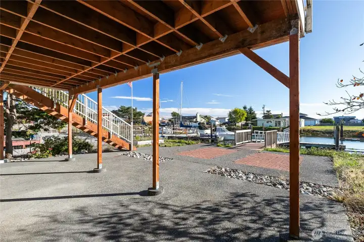 Covered patio is nice place for shade or shelter. Perhaps a hot tub?