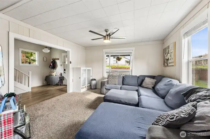 Cozy living room with windows facing North and East
