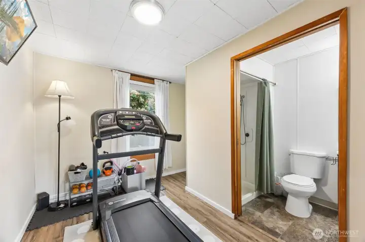 Main floor bedroom ideal for multi Gen living or bonus office space with closet tucked around the corner.