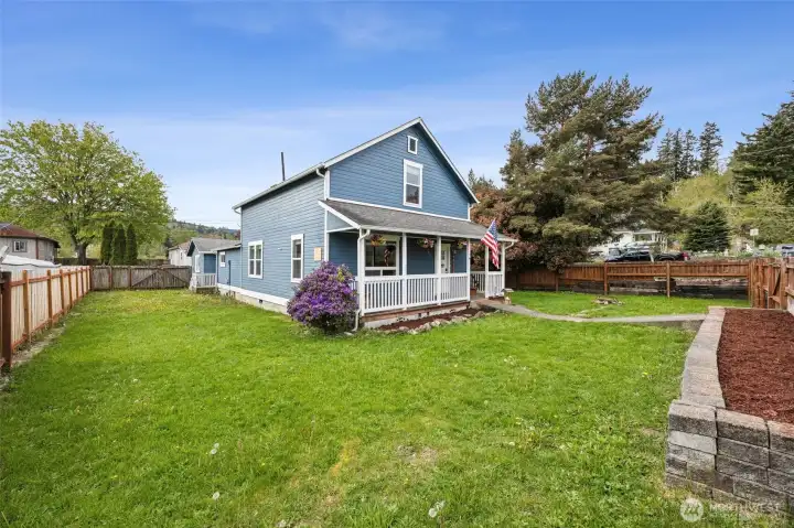 Plenty of yard space to convert into a garden, fruit trees, berries, a playset...