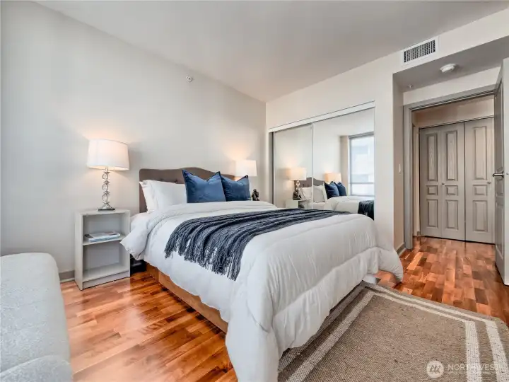 Smart mirrored accents and architectural cutouts amplify the sense of space and light in your private quarters. This is a staged photo