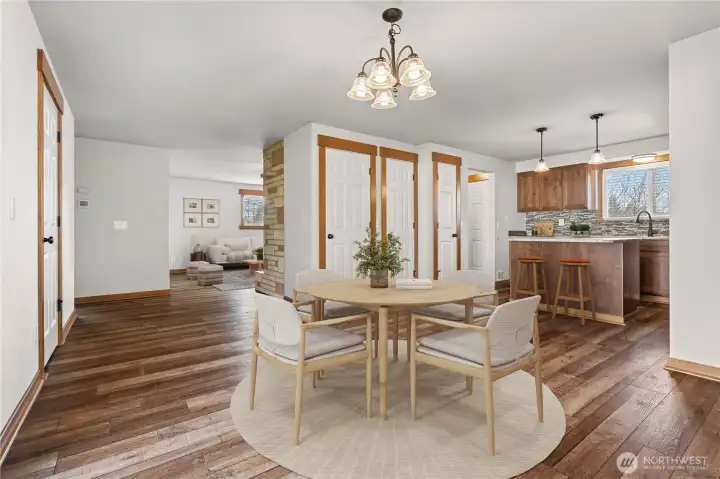 virtually staged dining room off kitchen.