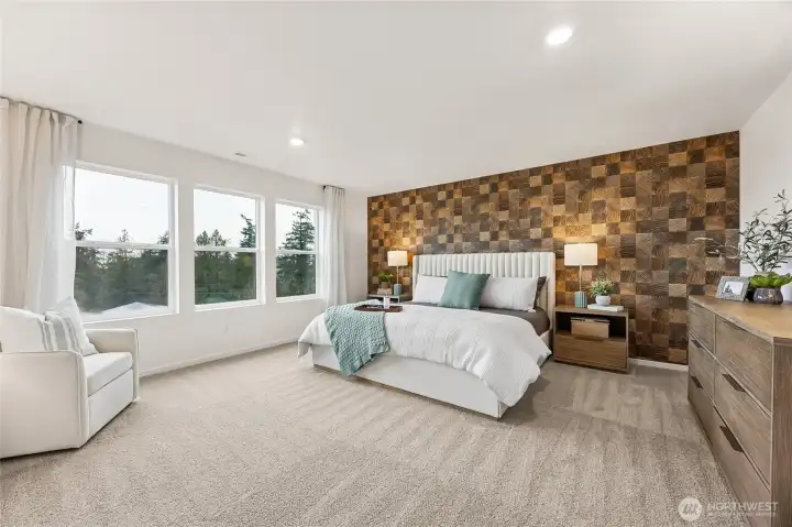 Large windows in the huge primary bedroom allow lots of natural light. Photo is representational. Actual home is under construction and colors, materials, and finishes may vary. See site agent for details. Large windows in the huge primary bedroom allow lots of natural light. Photo is representational. Actual home is under construction and colors, materials, and finishes may vary. See site agent for details.