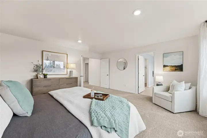 Primary bedroom can accommodate a King size mattress and more. Photo is representational. Actual home is under construction and colors, materials, and finishes may vary. See site agent for details.