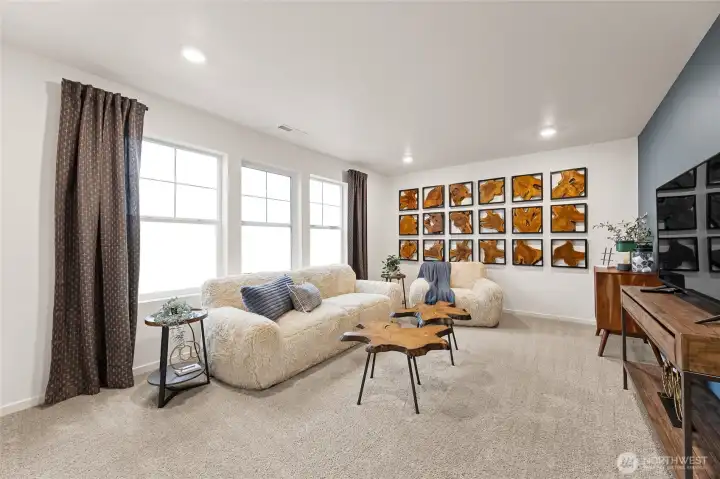 Big bonus room can double as a 6th bedroom with closet. Photo is representational. Actual home is under construction and colors, materials, and finishes may vary. See site agent for details.