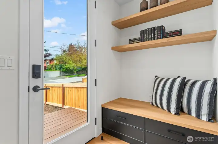 Chic built-ins adjacent to the front door.
