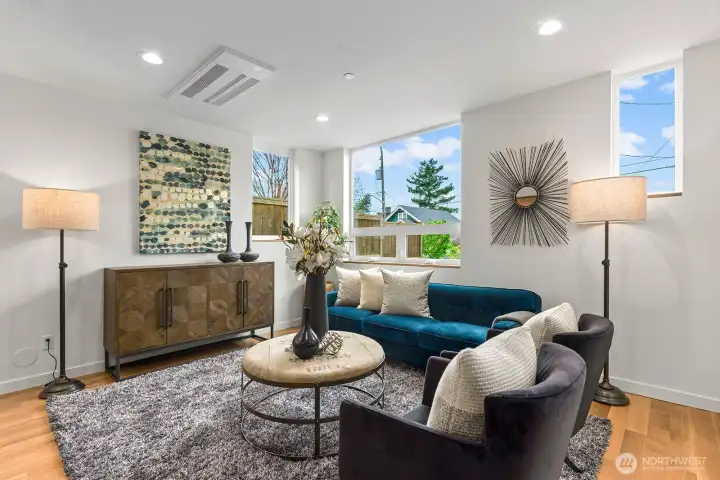 Expansive windows provide ample natural light.