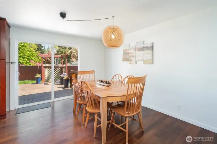 Large dining space leads onto a large back deck for indoor/outdoor living