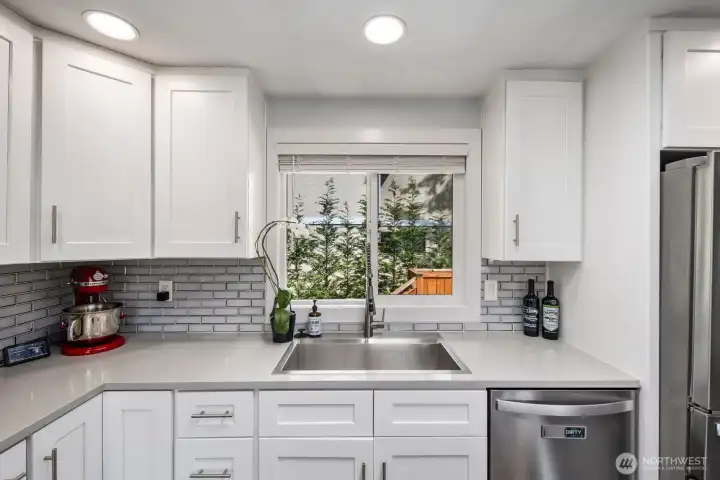 Bright and welcoming kitchen with morning light pouring through the windows, creating a warm space for cooking, gathering, and everyday living Bright and welcoming kitchen with morning light pouring through the windows, creating a warm space for cooking, gathering, and everyday living