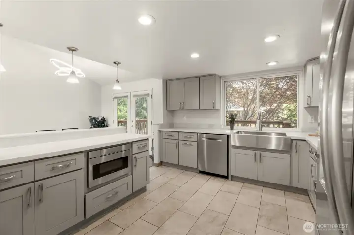 Peninsula adds convenient extra prep space for too many cooks in the kitchen. Peninsula adds convenient extra prep space for too many cooks in the kitchen.