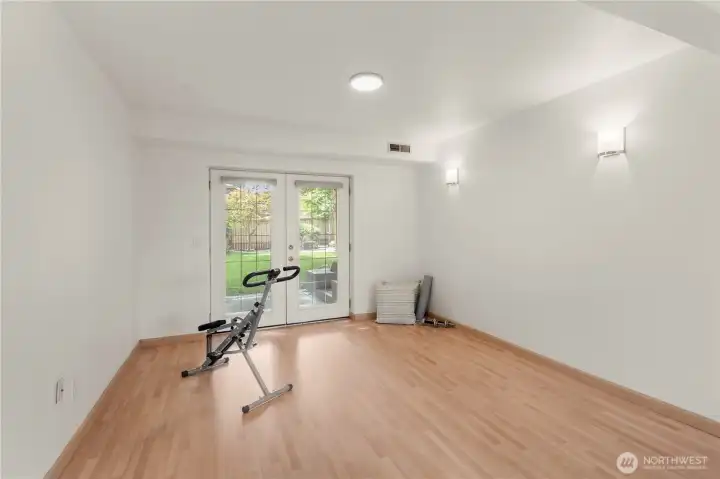 Expansive area in the lower level is perfect for workout equipment, hobby area, gaming station. Expansive area in the lower level is perfect for workout equipment, hobby area, gaming station.
