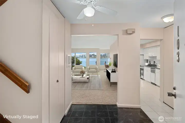 From the moment you step inside this beautifully designed two-level townhouse-style condo, you’re welcomed by breathtaking panoramic views of the Seattle skyline and Puget Sound.
