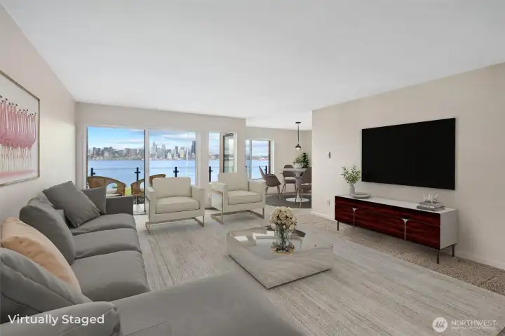 This beautifully maintained, move-in ready condo is designed to showcase its spectacular setting, with stunning city and waterfront views enjoyed from nearly every room in the home. Expansive windows fill the living spaces with natural light while framing breathtaking vistas of the Seattle skyline, Elliott Bay, and the surrounding scenery. Whether you’re relaxing in the living room, waking up in the bedroom, or enjoying your morning coffee, the ever-changing cityscape provides an incredible backdrop to everyday living.
