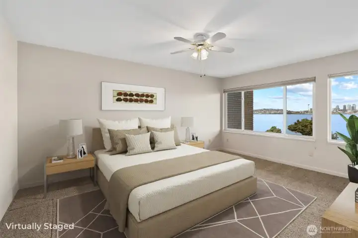 The primary suite also enjoys impressive, sweeping views, offering a serene and picturesque backdrop that enhances the comfort and tranquility of the space.