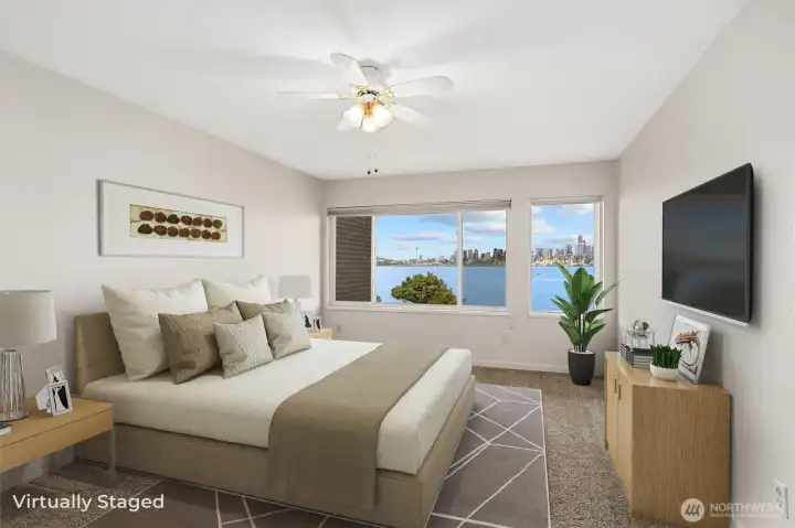 The primary suite also enjoys impressive, sweeping views, offering a serene and picturesque backdrop that enhances the comfort and tranquility of the space.