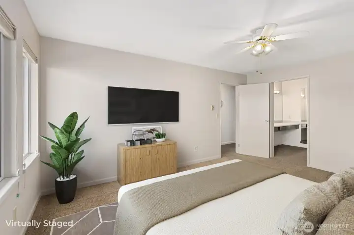 Another perspective of the primary suite highlights the view toward the dressing area.