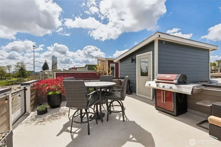 Welcome to the magnificent roof top! BBQ grill stays and is connected directly to the gas line for easy use.
