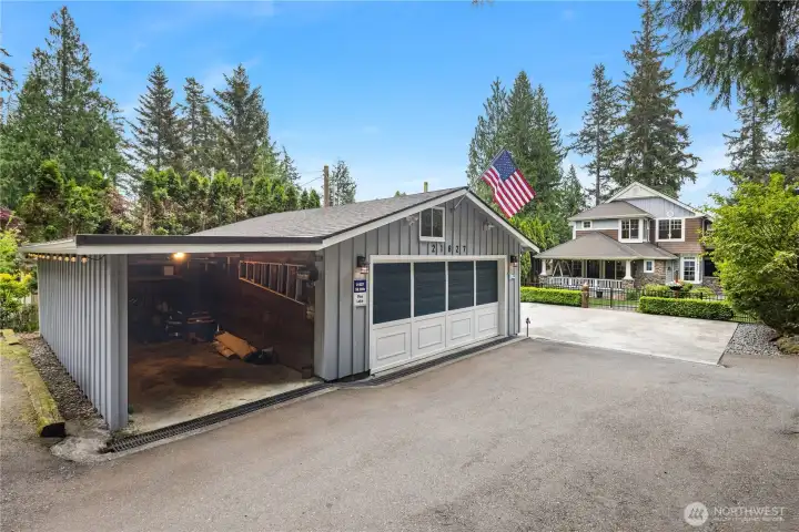 Large garage for 2 cars and covered parking for a 3rd car. Large garage for 2 cars and covered parking for a 3rd car.