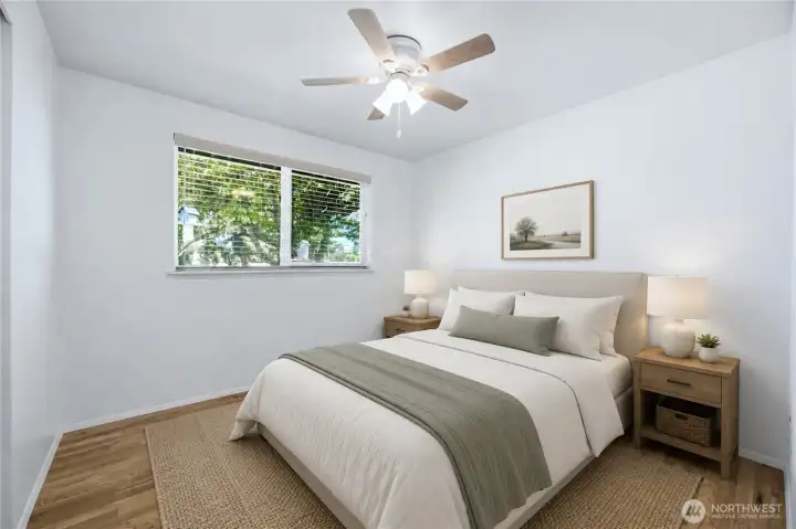 Bedroom #1 with real hardwood floors. Virtually staged.