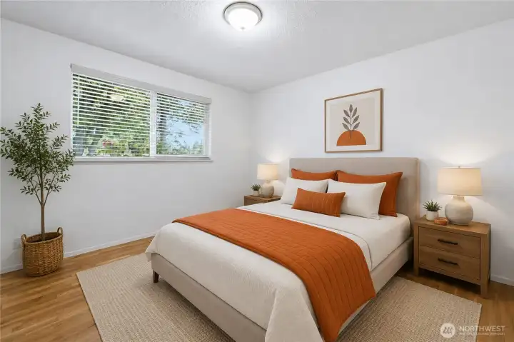 Bedroom #2 with real hardwood floors. Virtually staged