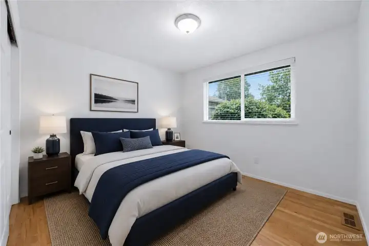 Bedroom #3 with real hardwood floors. Virtually staged