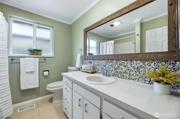 Main bathroom with its own large storage closet