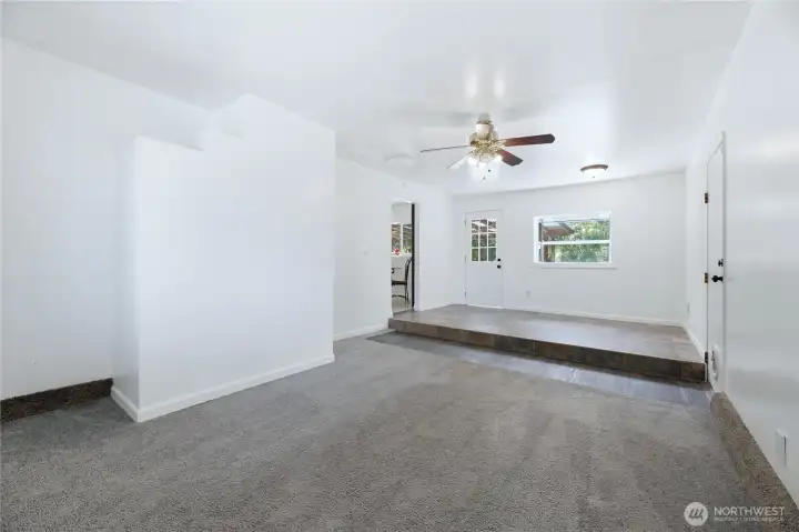 Family room off the dining room. Access to backyard