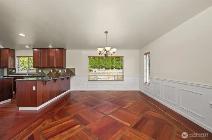Dining room. Brazilian Cherry hardwood flooring throughout the main home.