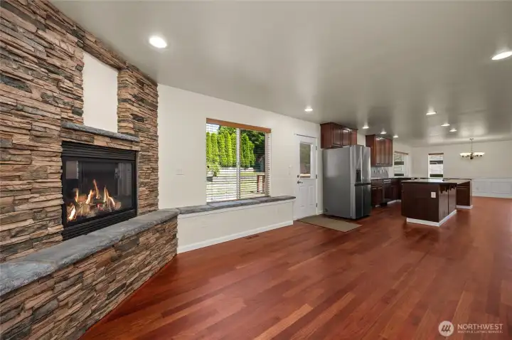 View of the kitchen and dining room beyond from the family room.
