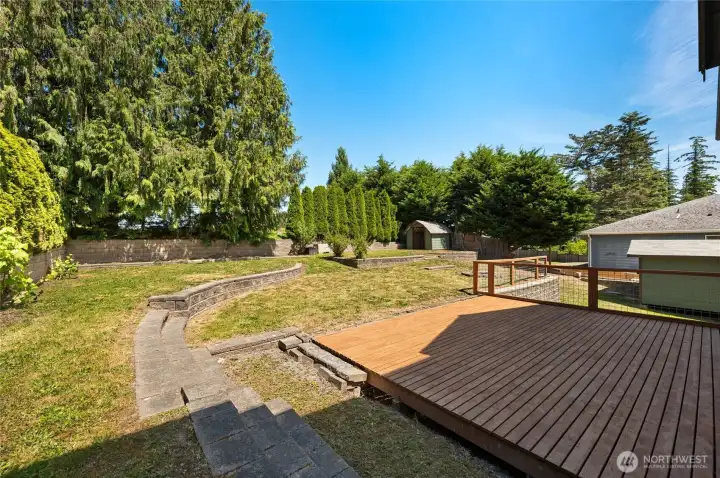Backyard and spacious deck.